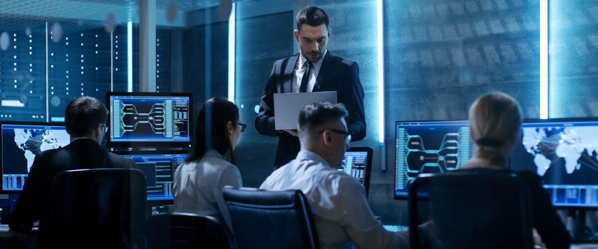IT training classroom with students working at computers